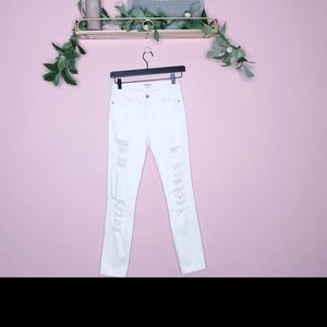 FRAME Le Skinny De Jeanne Distressed Denim Skinny Jeans